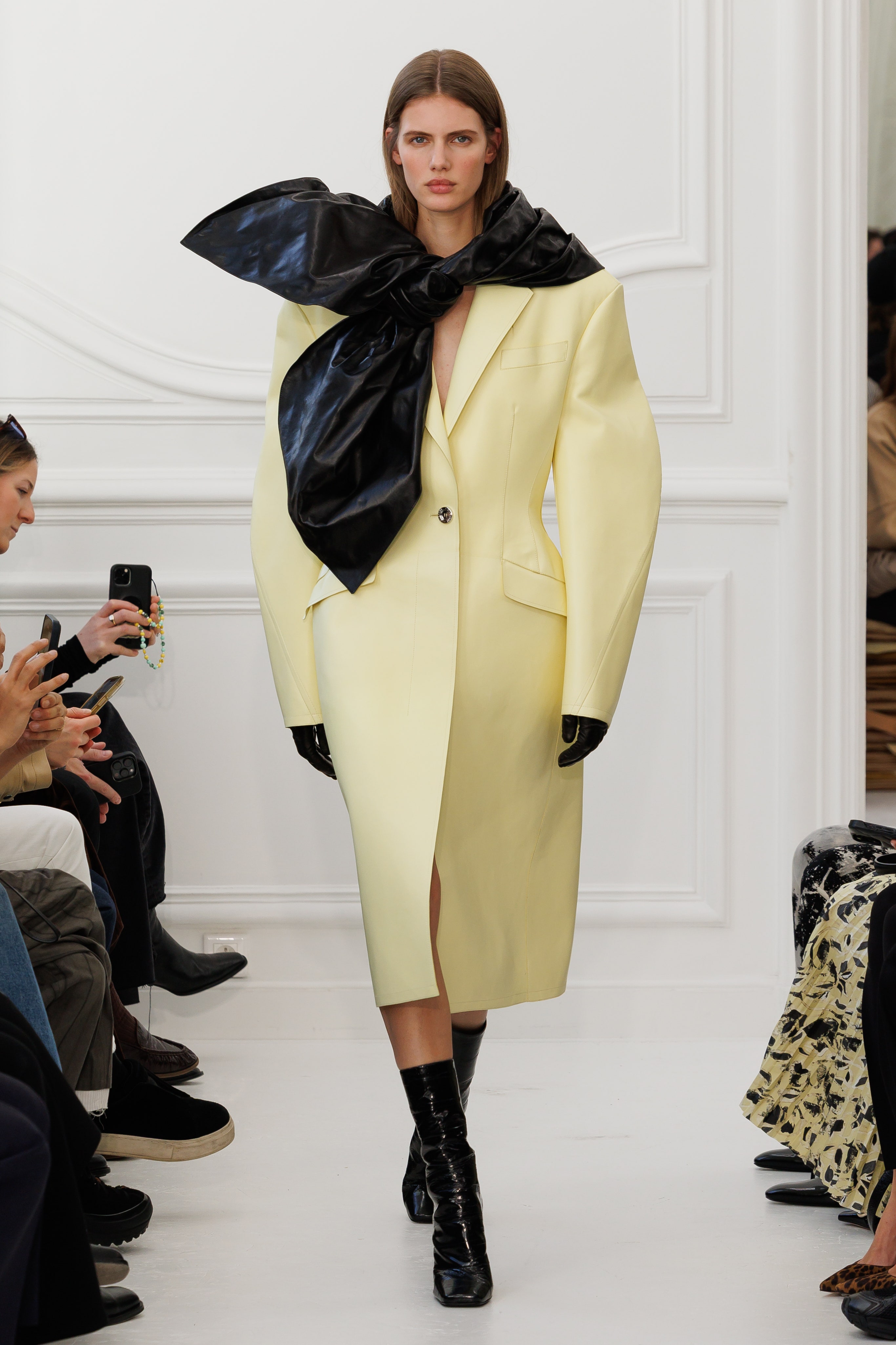 Fashion model in black blazer dress